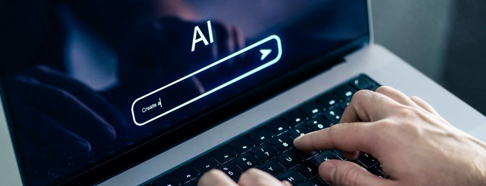 Man using chatbot with laptop at work