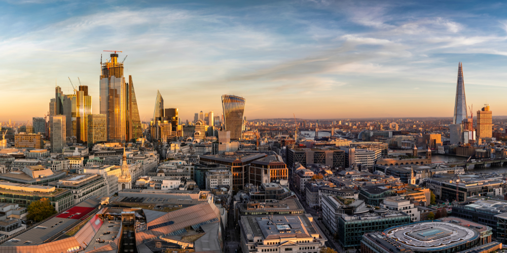 London's city skyline featuring famous landmarks at sunset
